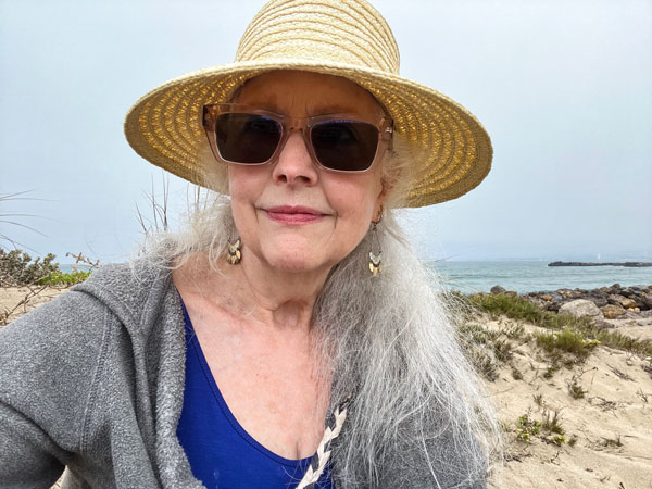 Sharon Peaslee on a beach